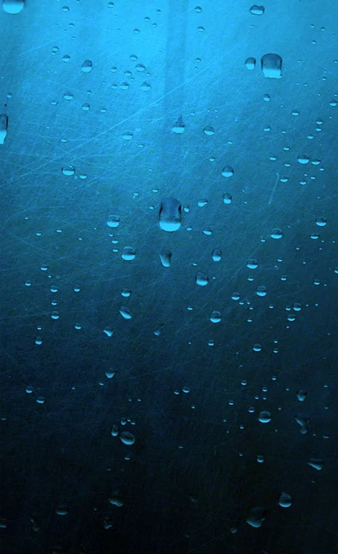 质感纹路背景下的水滴高清手机桌面