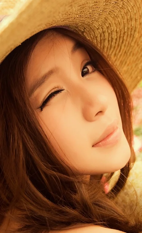 戴着草帽的美女高清手机桌面壁纸