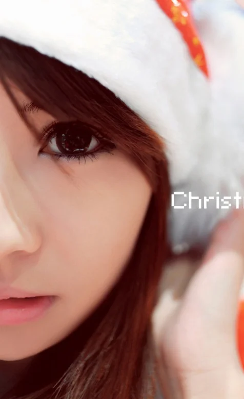 戴着圣诞帽的美女手机壁纸
