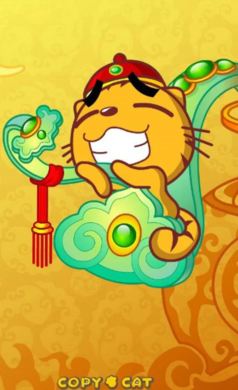 坐在玉如意上的猫咪