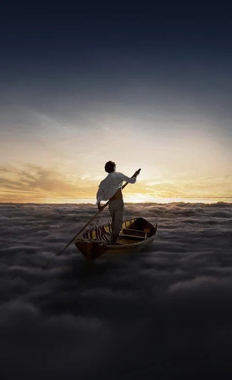 在云彩上划船的少年