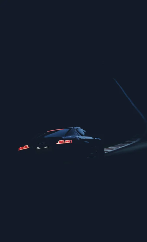 夜间山路上的奥迪超跑帅气尾灯手机壁纸