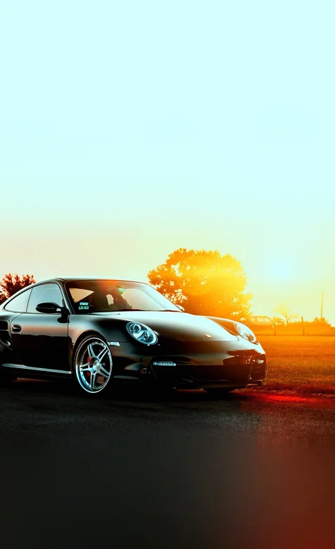 夕阳下的静态保时捷911手机壁纸