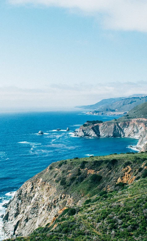 海岛悬崖蓝色护眼手机背景