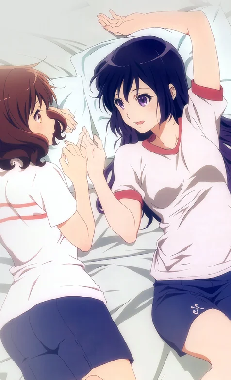 床上的2个动漫少女手机背景图片