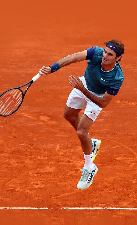 球场上的网球王子费德勒帅气运动手机壁纸