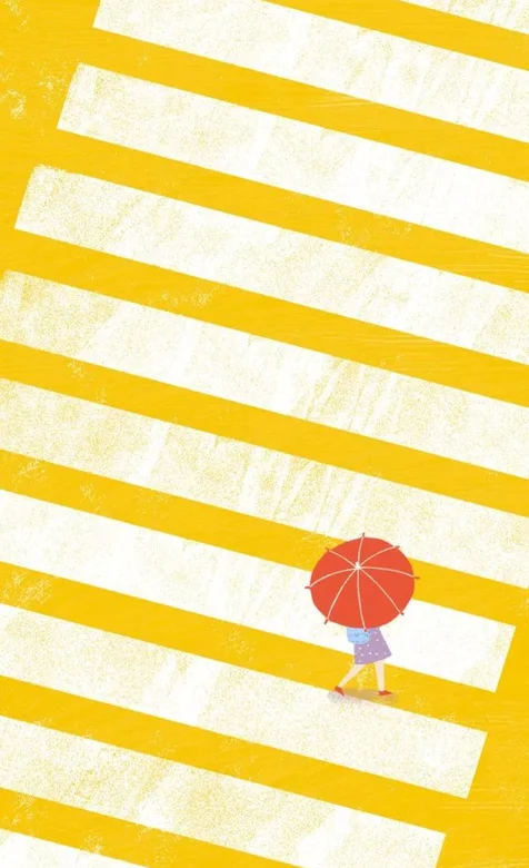 打红伞走在斑马线的少女