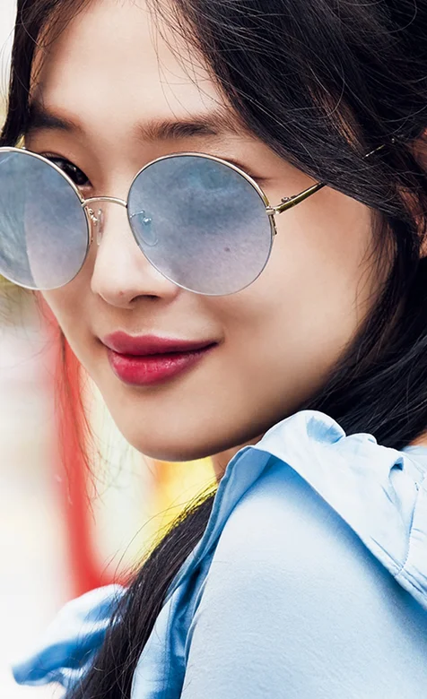 戴着淡蓝色墨镜的亚洲美女高清手机壁纸