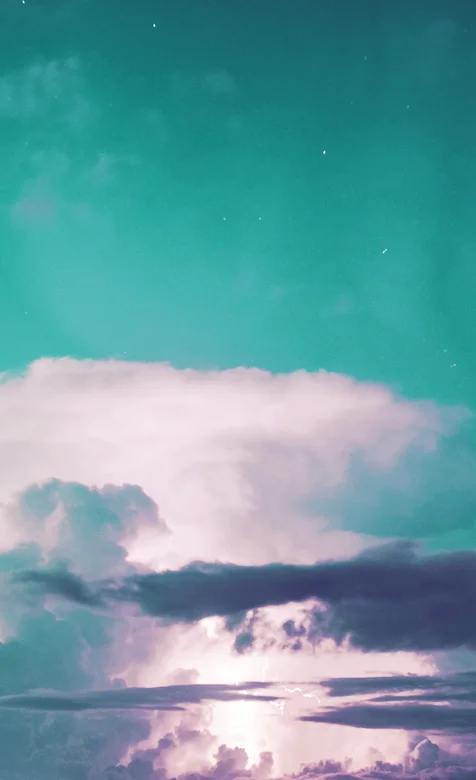 青色城市上空晚霞创意手机壁纸